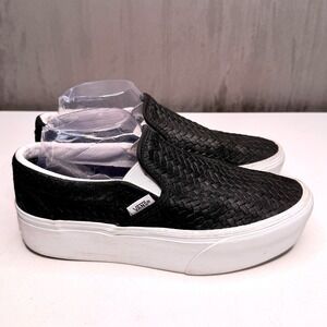 Vans Black Woven Slip-On Sneakers with White Platform Sole.